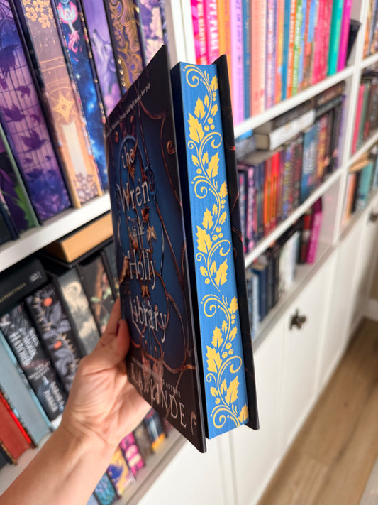 The Wren in the Holly Library – K. A. Linde (Hardback)