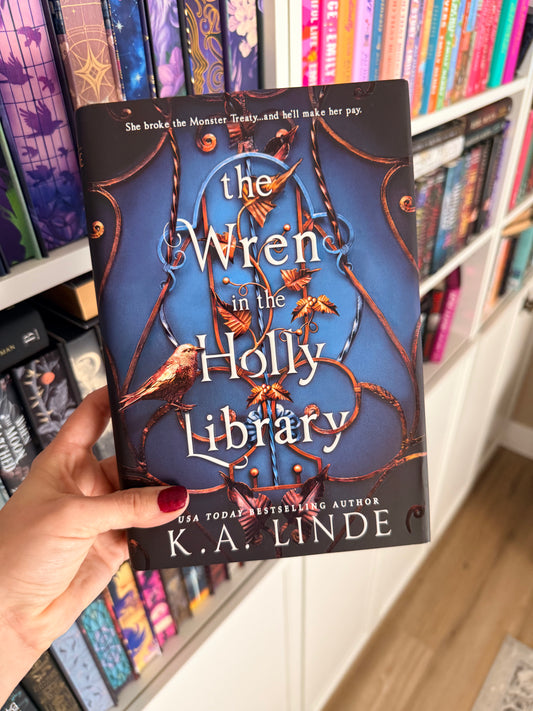 The Wren in the Holly Library – K. A. Linde (Hardback)